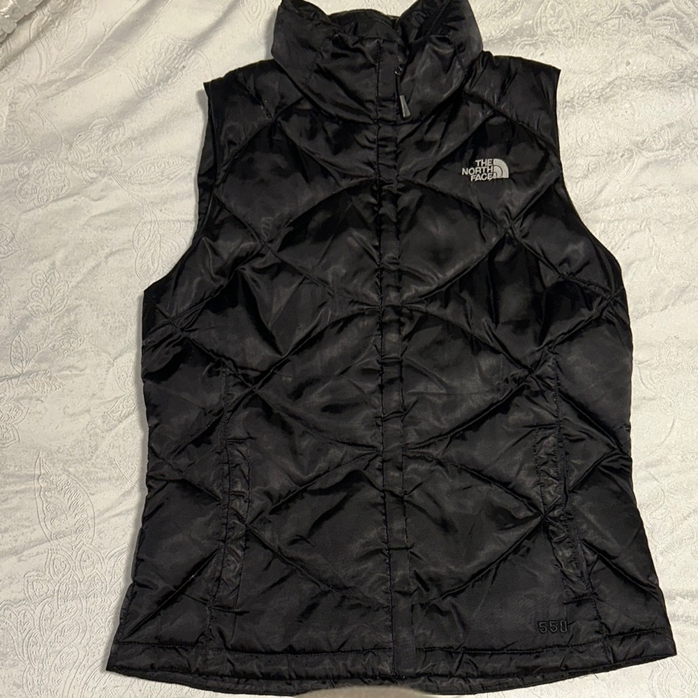 The North Face Black Puffer Vest.